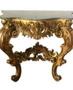 Tische. Wooden, gilded console of the 19th century.