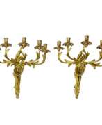 Wall lights. Pair of bronze sconces. The turn of the 19th and 20th centuries.