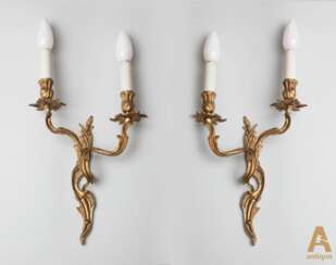 Pair of bronze wall sconces.