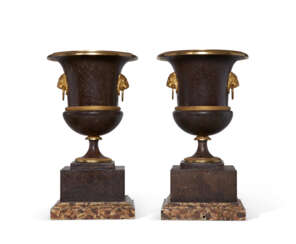 A PAIR OF EMPIRE ORMOLU AND TOLE PEINTE URNS