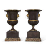 A PAIR OF EMPIRE ORMOLU AND TOLE PEINTE URNS - photo 1