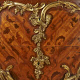 A FRENCH ORMOLU-MOUNTED BOIS SATINE, MAHAOGANY AND BOIS-DE-BOUT MARQUETRY COMMODE - photo 2