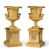 A LARGE PAIR OF EMPIRE ORMOLU URNS - photo 1