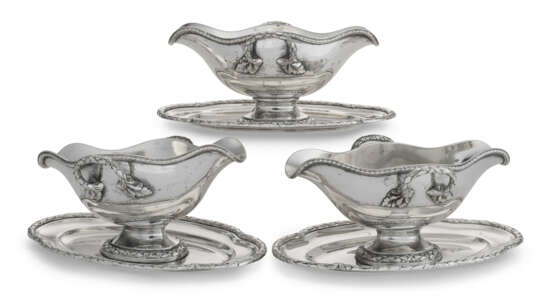 A SET OF THREE GERMAN SILVER SAUCE BOATS ON FIXED STANDS - photo 1