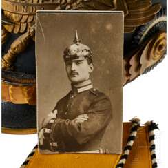 A helmet for Prussian One Year Guard Infantry volunteers, with shoulder boards and photo of owner