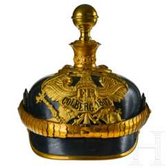 A helmet for Prussian Field Artillery Regiment 10 Officers with Colberg banner
