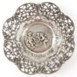 Schale, rund, 800er Silber, Boden mit Engel-Relief, floral durchbrochene Wandung mit geschweiftem Rand, 85 g, H. 3 cm, Dm. 14 cm - Аукционные цены