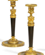 Decor. France. COUPLE OF BRONZE CANDELSTICKS EMPIRE WITH HERMAS