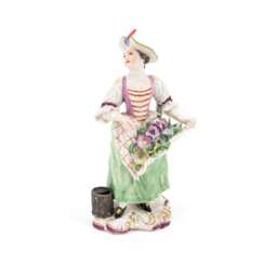 Höchst. PORCELAIN LADY WITH STRAW HAT AND FLORAL APRON