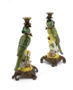 Decor. France. PAIR OF EXTRAORDINARY PORCELAIN CANDLESTICKS WITH PARROTS