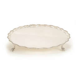 A George III silver tray with feet