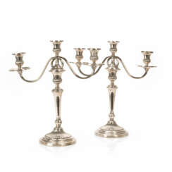 A pair of 3-flame silver candlesticks