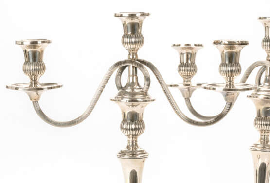 A pair of 3-flame silver candlesticks - фото 2