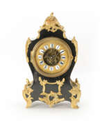 Decorative clocks. Mantel clock with visible escapement