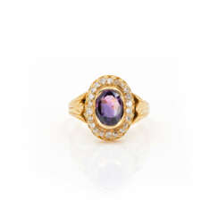Ring with amethyst and diamond setting
