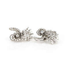Pair of clip earrings set with diamonds