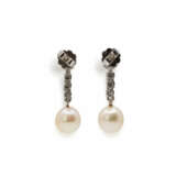 Stud earrings with pearl-diamond setting - photo 2