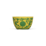 A FINE AND EXTREMELY RARE CARVED YELLOW-GROUND GREEN-ENAMELLED ‘LOTUS’ WINE CUP - photo 2