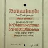 NSDAP: Dienstauszeichnung, in Bronze Urkunde. - Foto 1