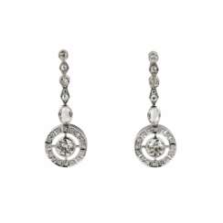 White gold 18 К earrings with diamonds.