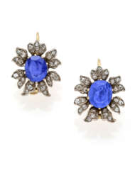 Oval ct. 2.60 circa and ct. 2.40 circa sapphire, old mine diamond, yellow gold and silver floral shaped earrings, diamonds in all ct. 0.60 circa, g 12.53 circa, length cm 2.40 circa. | | Appended short report CISGEM n. 27580 22/04/2024, Milano