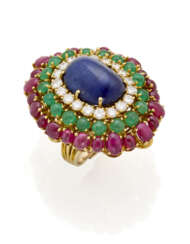 Cabochon ct. 19.00 circa sapphire, emerald, ruby and diamond yellow gold ring convertible into a brooch, diamonds in all ct. 1.90 circa, g 38.06 circa, length cm 3.9 circa size 11/51. Marked 1647 AL. (slight defects)