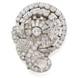 Round, baguette and tapered diamond white gold brooch, in all ct. 11.80 circa, g 30.81 circa, length cm 5.10 circa. - photo 1