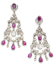Old mine diamond, ruby and platinum pendant earrings, rubies in all ct. 6.00 circa, diamonds in all ct. 4.60 circa of which two ct. 0.90 circa pear diamonds, with previous fittings, in all g 25.71 circa, length cm 6.60 circa.