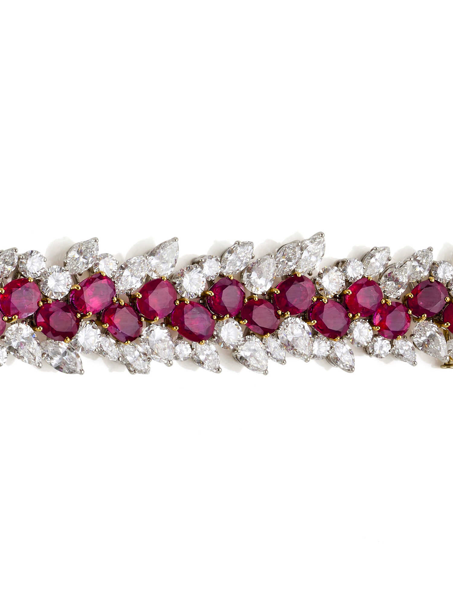 BULGARI | Ruby, diamond, yellow gold and platinum bracelet, rubies in all ct. 45.00 circa, diamonds in all ct. 33.30 circa, g 69.22 circa, length cm 18.0 circa. Signed Bvlgari. In Bvlgari pouch | | Appended gemmological report SSEF n. 137096 21/03/2