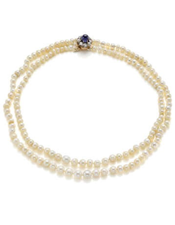 Two strand natural slightly irregular saltwater pearl graduated necklace accented with cabochon ct. 3.30 circa sapphire, diamond, yellow gold and silver clasp, mm 4.20 to mm 6.60 circa pearls, diamonds in all ct. 1.10 circa, g 33.40 circa, length cm - фото 1