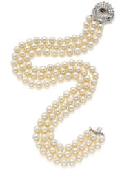 Three strand pearl necklace with a diamond and white gold spiral shaped clasp, diamonds in all ct. 5.50 circa, mm 9.00/9.50 circa pearls, g 162.07 circa, length cm 44.5 circa. Marked 83 CO.