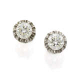 Round ct. 1.00 circa diamond and white gold earrings, in all ct. 2.00 circa, g 3.69 circa, length cm 1.0 circa. French goldsmith and assay marks on the stops. - photo 1