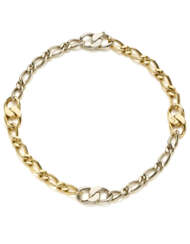 POMELLATO | Bi-coloured gold groumette link chain necklace, g 86.01 circa, length cm 38.80 circa. Signed Pomellato.