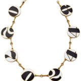 FARAONE - GIO' CAROLI | Yellow gold chain necklace with white and black enamel medallions, g 82.34 circa, length cm 44.4 circa. Signed Giò Caroli per Faraone. - фото 1