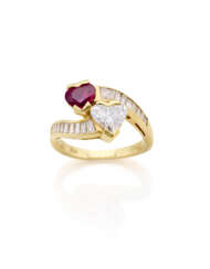 Heart shaped ct. 1.20 circa ruby and ct. 1.25 circa diamond yellow gold ring accented with baguette and tapered diamonds on the stem, diamonds in all ct. 1.90 circa, g 5.49 circa size 12/52.
