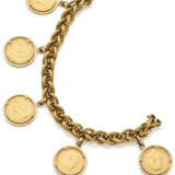 Yellow gold striped link bracelet holding five coin charms, g 72.66 circa, length cm 19.0 circa. Marked 14 MI. - photo 2