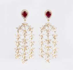 A Pair of sparkling Diamond Ruby Pendants 'Fleur de joie'.