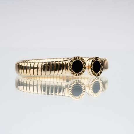 Bulgari. A Gold Onyx Bangle Bracelet 'Tubogas'. - фото 2