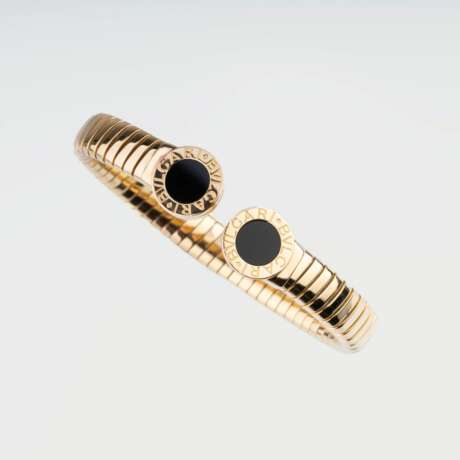 Bulgari. A Gold Onyx Bangle Bracelet 'Tubogas'. - фото 4