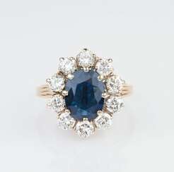 A Diamond Ring with Natural Sapphire.