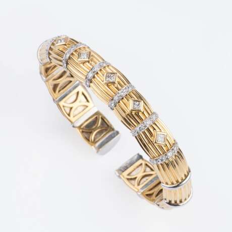 A Gold Bangle Bracelet with Diamonds. - photo 2