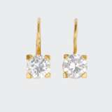 Brahmfeld & Gutruf. A Pair of fine-white Solitaire Earrings. - photo 1