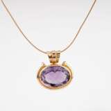 An Amethyst Pendant on Gold Necklace. - фото 1
