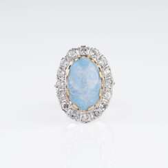 An Opal-Diamond Ring.