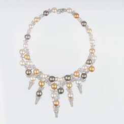 A highcarat Diamond Necklace with multi-coloured Southsea Pearls.