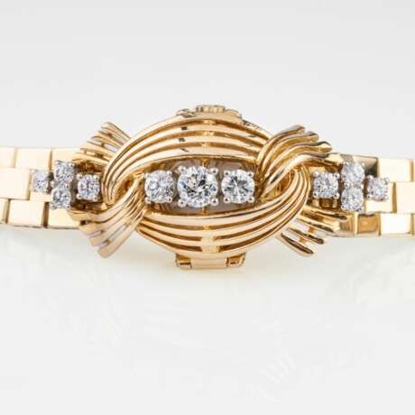 Universal Genève. A Vintage Lady's Wristwatch with Diamonds by Knoll & Pregizer. - фото 3