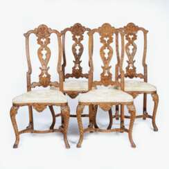 A Set of 4 Rococo Chairs with rare Scale Carving.