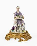 Иоганн Иоахим Кендлер. Johann Joachim Kaendler (Fischbach/Sachsen 1706 - Meissen 1775). A Japanese with Child and Ormolu Mounting.