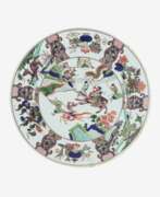 Asian products and art. A Large Famille Verte Dish with Battle Scenes.