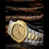 PATEK PHILIPPE. A STAINLESS STEEL AND 18K GOLD AUTOMATIC WRISTWATCH WITH SWEEP CENTRE SECONDS, DATE AND BRACELET - photo 1